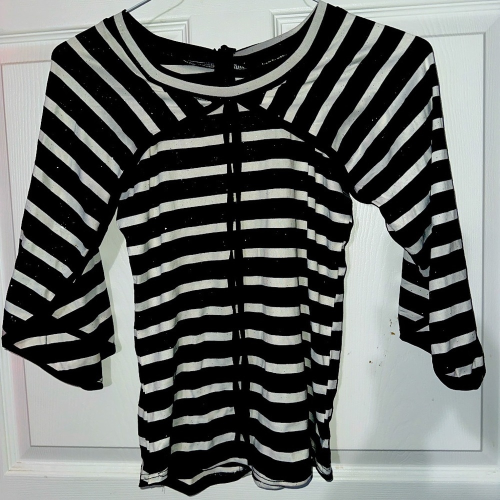 This is a striped shirt that has like a tank top and a shoulder shirt